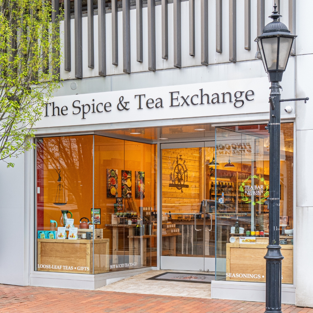 The Spice & Tea Exchange storefront at 118 Main Street, with loose-leaf teas, gifts and the tea bar visible through the windows